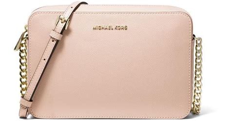 michael kors light pink messenger bag leather last season|Michael Kors pink crossbody bags.